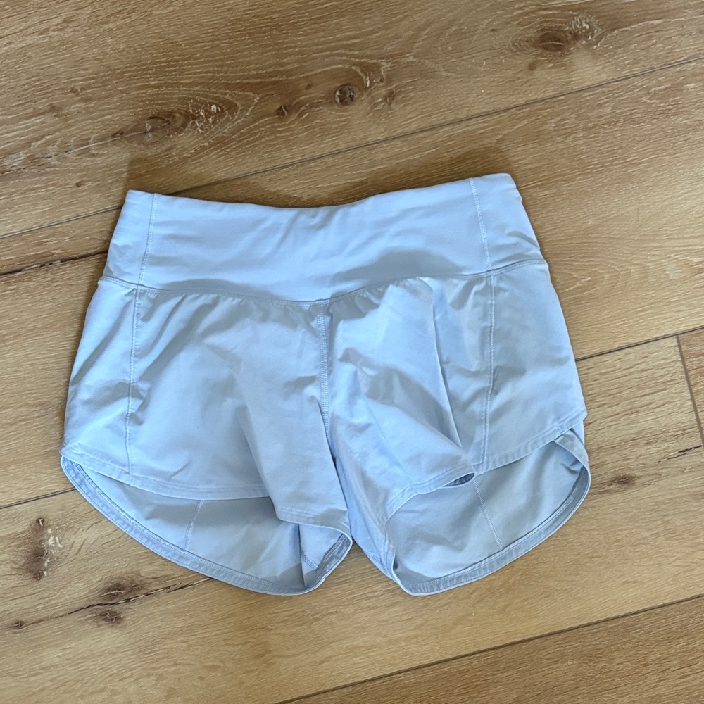 Speed Up Mid Rise Lined Short 4” in Blue Linen
